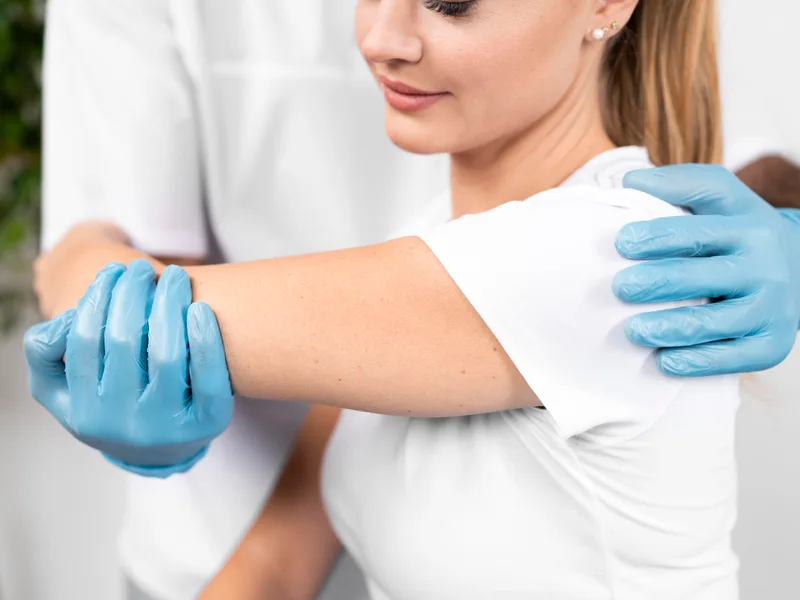 Chiropractic care for arm pain at Schomaker Chiropractic Clinic in Elk River