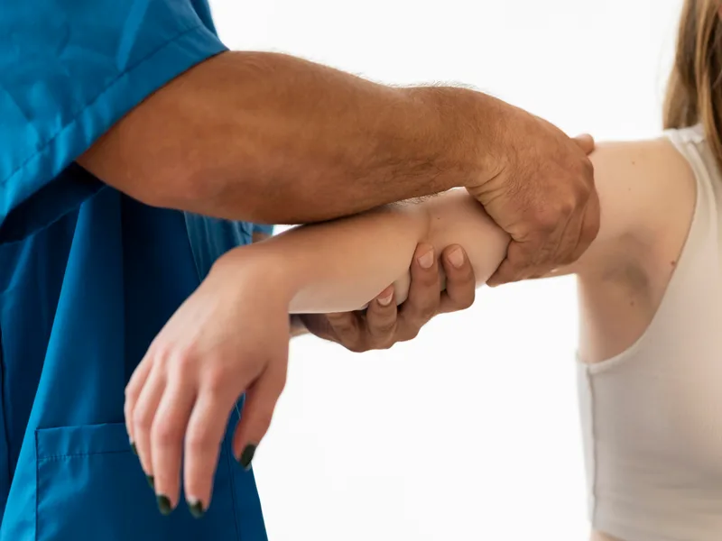 Chiropractic care for elbow pain at Schomaker Chiropractic Clinic in Elk River